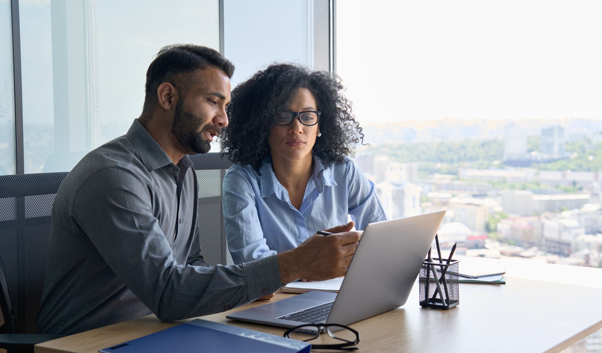 Consultant advising business leaders on IT infrastructure and budget planning.